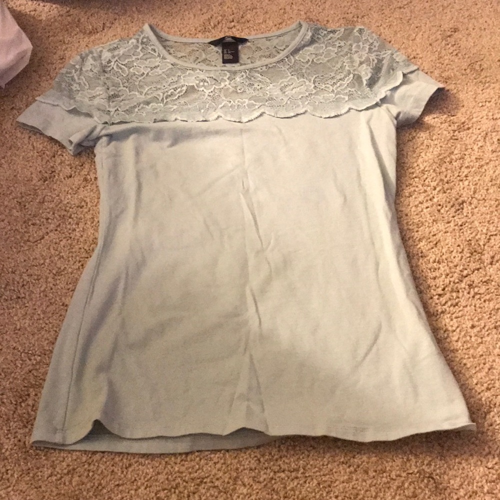 Light blue top